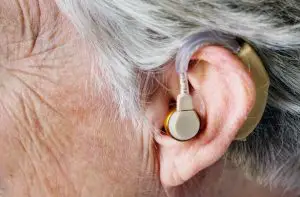 Woman with a hearing aid