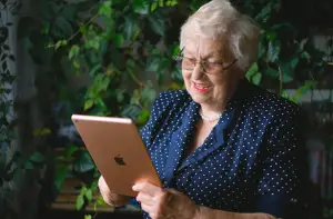older woman with iPad